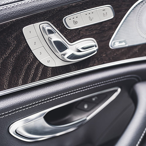 Close-up of bespoke fabricated internal controls of a car, made from stainless steel.