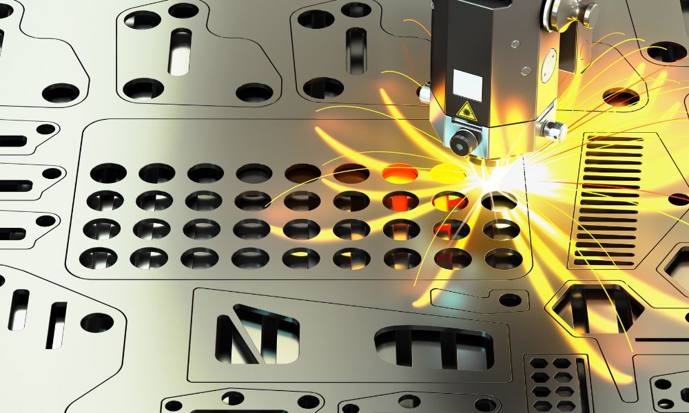 Close-up of a laser cutting machine, cutting round shapes from a sheet of metal.